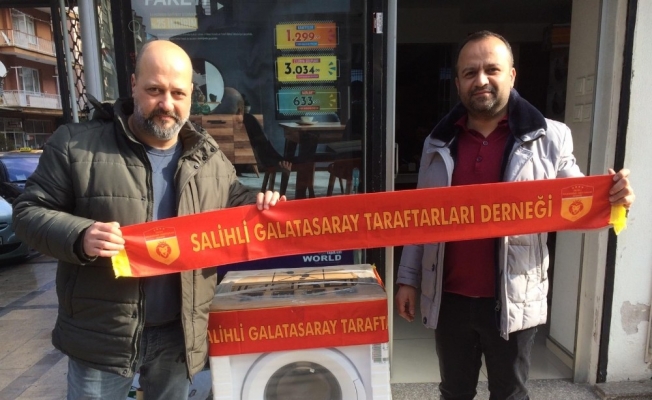 Galatasaraylı taraftarlardan Çocuk Evlerine çamaşır makinası